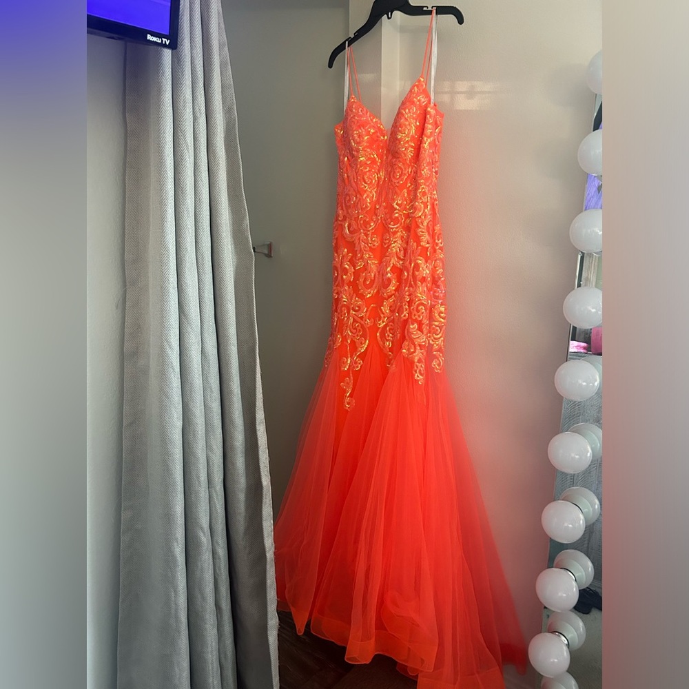 Bright orange mermaid style party dress